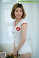 Ye Na hot beauty in nurse-style lingerie (9 photos)